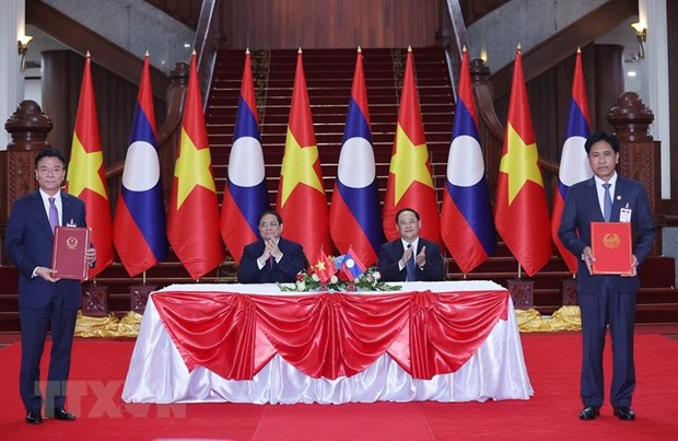 Hợp tác pháp luật và tư pháp góp phần củng cố quan hệ Việt Nam-Lào hình ảnh 1 Hop tac phap luat va tu phap gop phan cung co quan he Viet Nam-Lao hinh anh 1