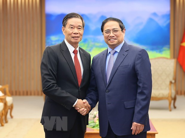 Thủ tướng: Việt Nam luôn quyết tâm kề vai sát cánh, hỗ trợ Lào hình ảnh 2 Thu tuong: Viet Nam luon quyet tam ke vai sat canh, ho tro Lao hinh anh 2