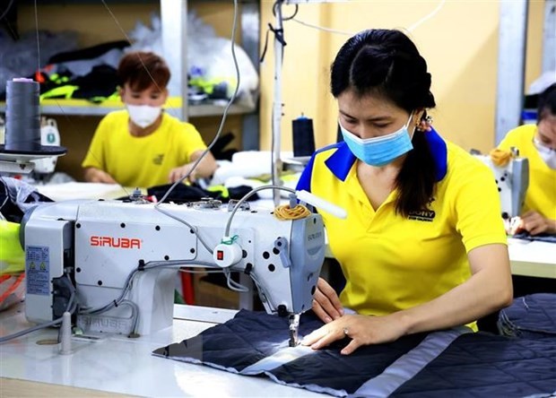 Công nhân may làm việc tại Công ty TNHH May mặc Dony, xã Vĩnh Lộc A, huyện Bình Chánh, Thành phố Hồ Chí Minh. Công nhân may làm việc tại Công ty TNHH May mặc Dony, xã Vĩnh Lộc A, huyện Bình Chánh, Thành phố Hồ Chí Minh.