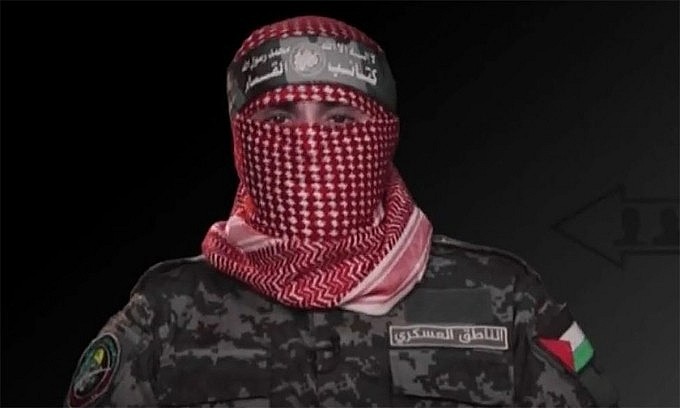 Phát ngôn viên cánh vũ trang của Hamas Abu Obeida trong tuyên bố ngày 16/10. Ảnh: Times of Israel Phát ngôn viên cánh vũ trang của Hamas Abu Obeida trong tuyên bố ngày 16/10. Ảnh: Times of Israel