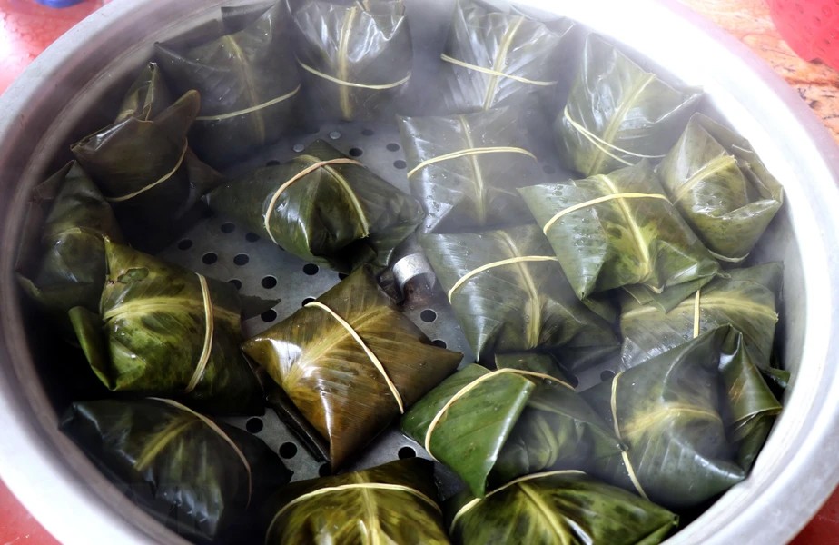 Bánh phu thê đã được hấp chính. Ảnh TTXVN Bánh phu thê đã được hấp chính. Ảnh TTXVN