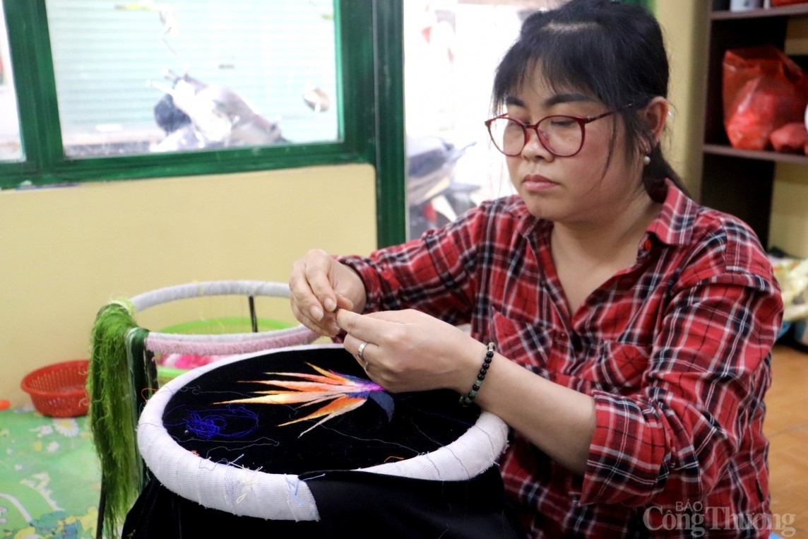 Thêu Quất Động Thêu Quất Động