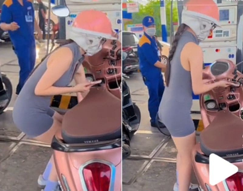 Hình ảnh cô gái mặc quần áo bó sát cơ thể đi đổ xăng bị chụp lén đưa lên mạng được lan truyền chóng mặt trên cộng đồng mạng. Ảnh cắt từ clip. Hình ảnh cô gái mặc quần áo bó sát cơ thể đi đổ xăng bị chụp lén đưa lên mạng được lan truyền chóng mặt trên cộng đồng mạng. Ảnh cắt từ clip.