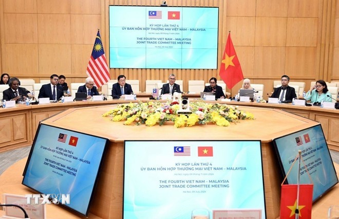 Kỳ họp thứ 4 Ủy ban Hỗn hợp Thương mại Việt Nam-Malaysia. Ảnh: TTXVN Kỳ họp thứ 4 Ủy ban Hỗn hợp Thương mại Việt Nam-Malaysia. Ảnh: TTXVN