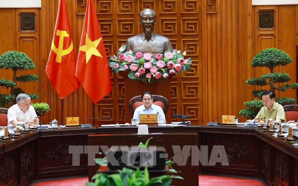 Thủ tướng Phạm Minh Chính chủ trì họp Thường trực Chính phủ với các bộ, ngành và Đoàn đàm phán Chính phủ về các vấn đề thương mại với Hoa Kỳ. Ảnh: Dương Giang-TTXVN