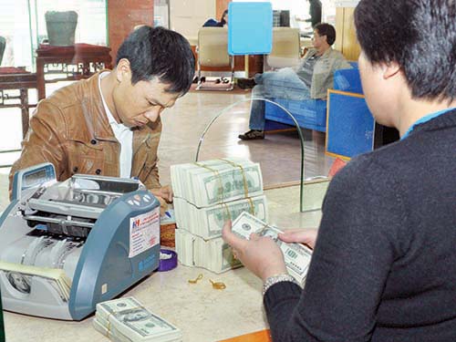 Năm 2014, giải quyết nợ xấu vẫn là nhiệm vụ trọng tâm của cả hệ thống ngân hàng\