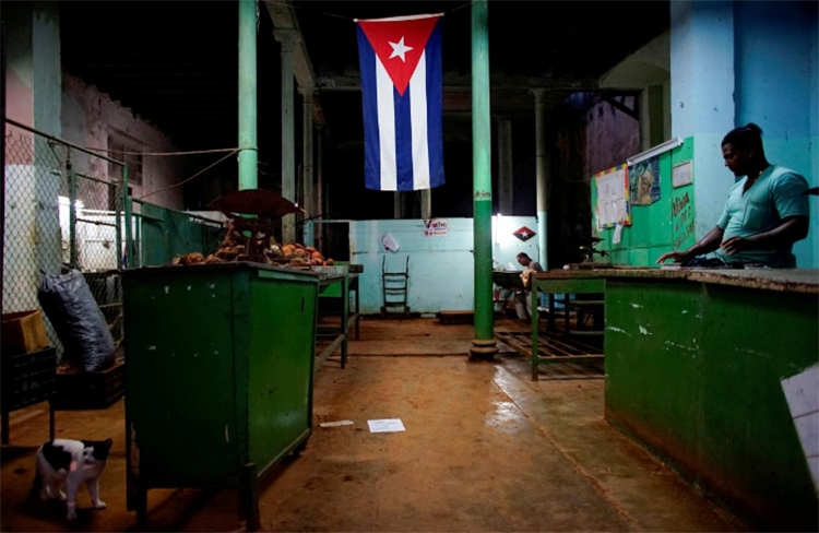 Cuba lowers economic growth forecast as trade continues to drop