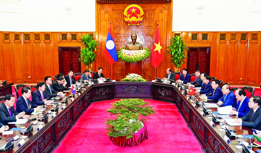 vietnam laos seek to boost trade by 10 15 percent