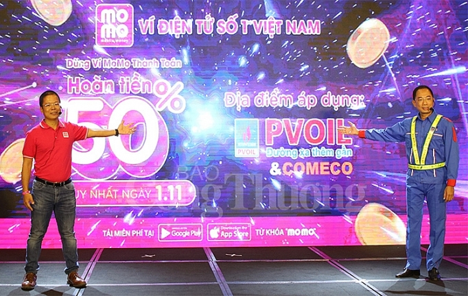 pvoil va comeco trien khai phuong thuc thanh toan dien tu bang ung dung vi momo