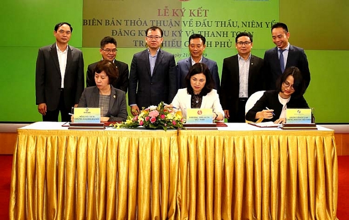 ky ket thoa thuan phoi hop dau thau niem yet trai phieu chinh phu