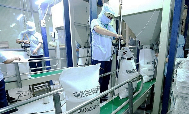 Quý I-2022, kim ngạch xuất khẩu nông sản của nước ta đạt 7,27 tỷ USD. Trong ảnh: Đóng bao gạo xuất khẩu tại Công ty Lương thực Sông Hậu (thành phố Cần Thơ). Quý I-2022, kim ngạch xuất khẩu nông sản của nước ta đạt 7,27 tỷ USD. Trong ảnh: Đóng bao gạo xuất khẩu tại Công ty Lương thực Sông Hậu (thành phố Cần Thơ).