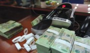 Rút tiền mặt từ trên 100 triệu tại Kho bạc Nhà nước phải đăng ký trước