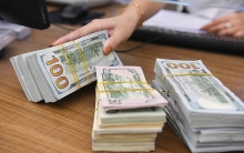 Ngân hàng Nhà nước tăng giá bán USD, lãi suất liên ngân hàng tăng vọt