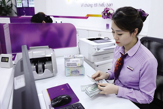 Việc nới biên độ tỷ giá sẽ giúp các ngân hàng thương mại linh hoạt hơn trong mua bán ngoại tệ