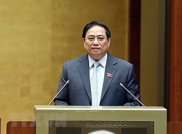 Thủ tướng Phạm Minh Chính phát biểu làm rõ các vấn đề liên quan trước Quốc hội. 