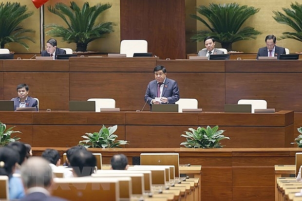 Bộ trưởng Bộ Kế hoạch và Đầu tư Nguyễn Chí Dũng phát biểu giải trình, làm rõ một số vấn đề đại biểu Quốc hội nêu