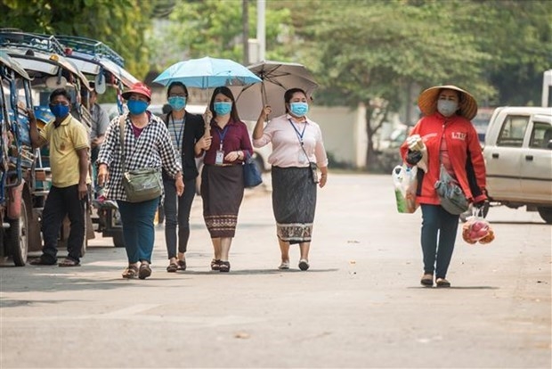Vietnamese in Laos advised to follow local COVID-19 regulations vietnamese in laos advised to follow local covid 19 regulations