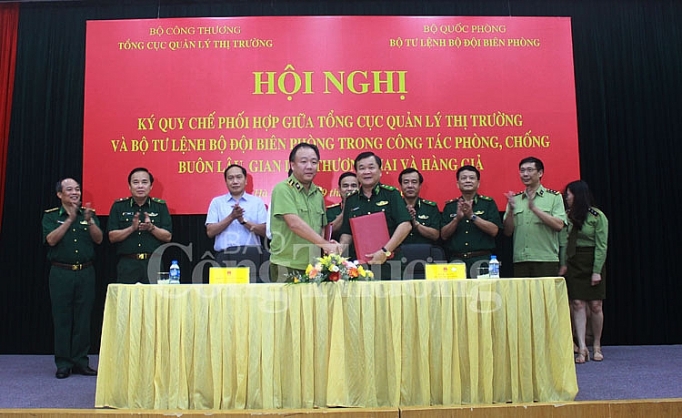 Tổng cục Quản lý thị trường ký Quy chế phối hợp với Bộ tư lệnh Bộ đội biên phòng tong cuc quan ly thi truong ky quy che phoi hop voi bo tu lenh bo doi bien phong