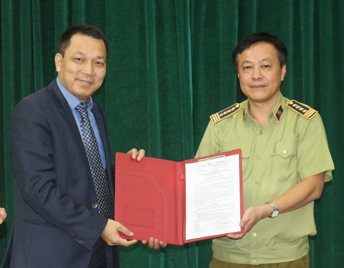 quan ly thi truong co ban hoan thien bo may to chuc theo huong tinh gian