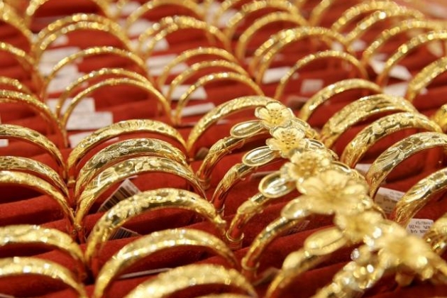 Vàng thế giới giảm, trong nước đứng yên Vàng thế giới giảm, trong nước đứng yên