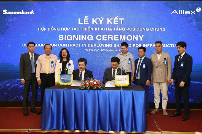 sacombank va alliex hop tac trien khai ha tang pos dung chung